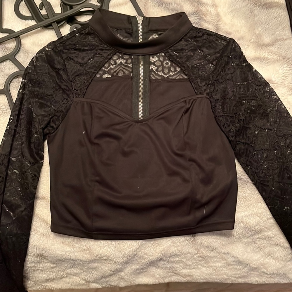 Black with lace sleeves crop top. Size S.